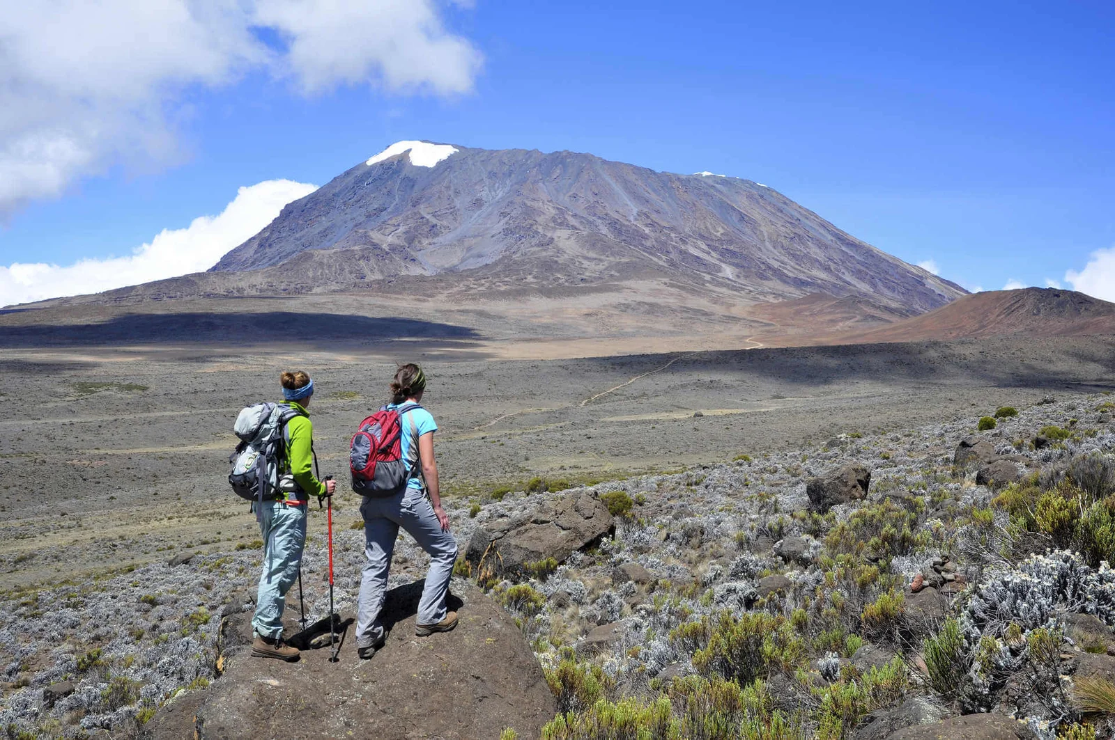 two-hikers-looking-at-the-mount-kilimanjaro-131